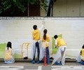 HDC현대산업개발, 용산구 용강중 담장에 벽화 봉사…지역 상생 지속
